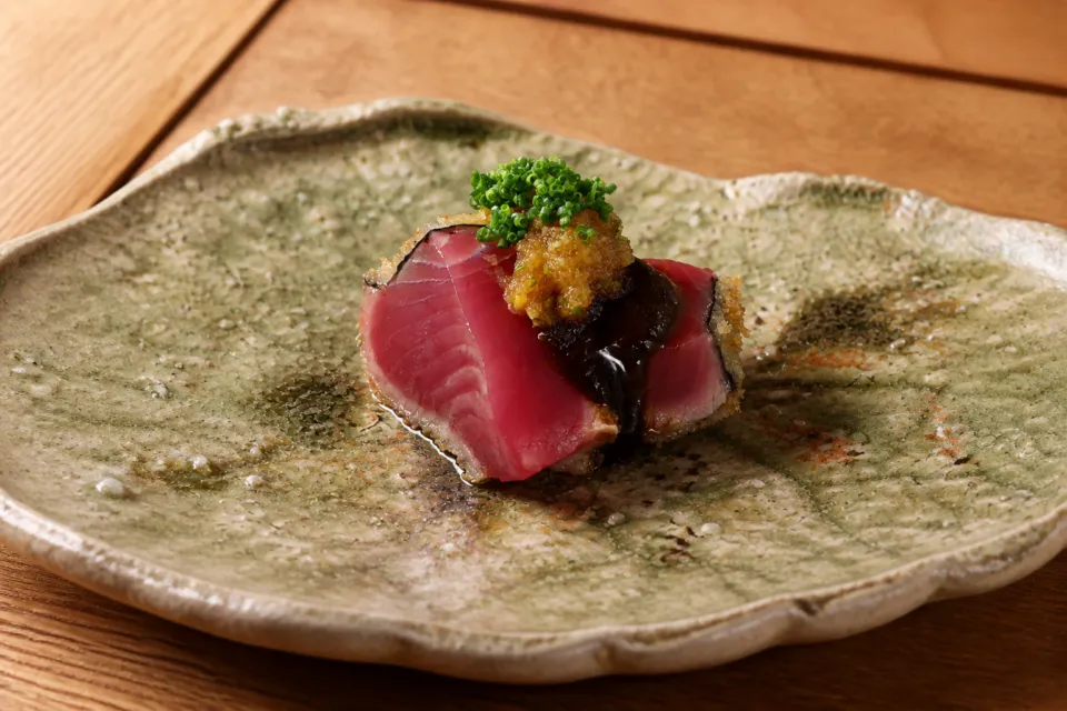 京都和久傳の薬味を添えた魚料理