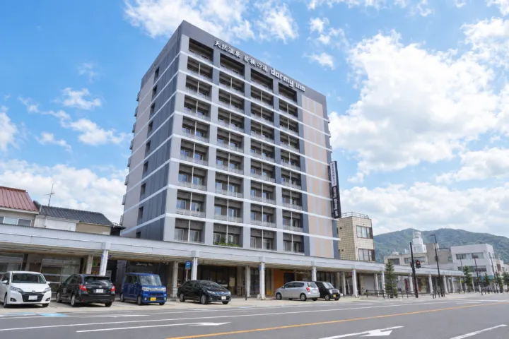 天然温泉 若狭の湯 ドーミーイン敦賀の建物全体と正面入口