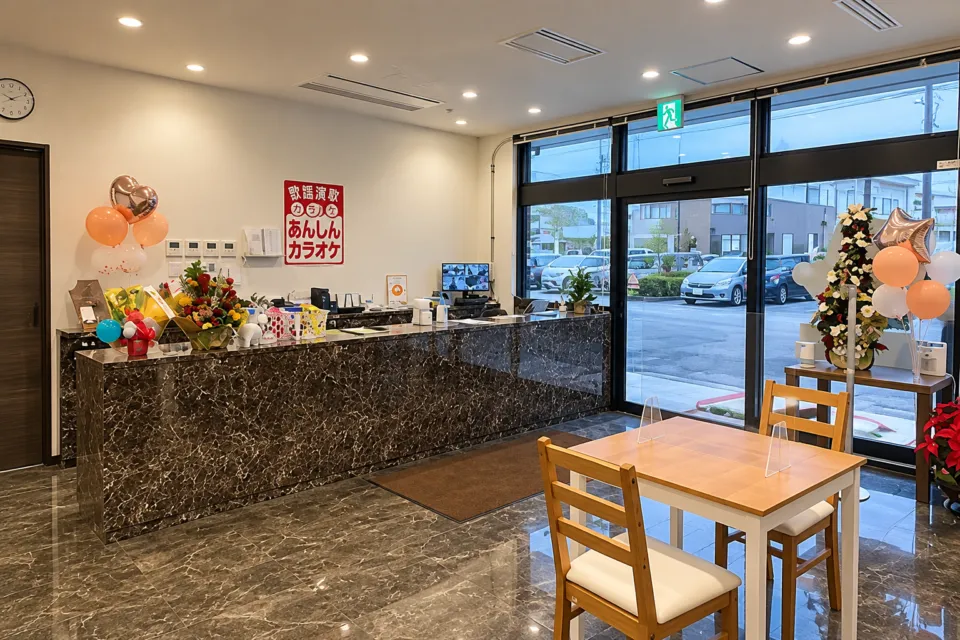 美祢グランドホテルのワンツークラブ受付カウンターと入口